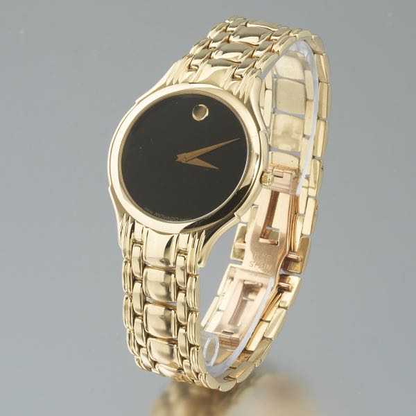 Appraisal: MOVADO MENS' K GOLD HEAD AND BRACELET WATCH RETAILED BY