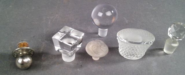 Appraisal: Assortment of Six Perfume Stoppers Crystal glass and metal