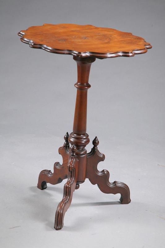 Appraisal: TILT TOP FERN STAND Walnut with a scalloped top turned