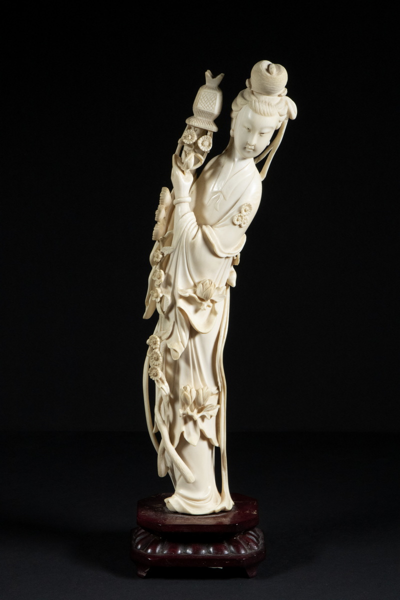 Appraisal: TH C CARVED CHINESE IVORY FIGURE OF QUANYIN Delicately Carved