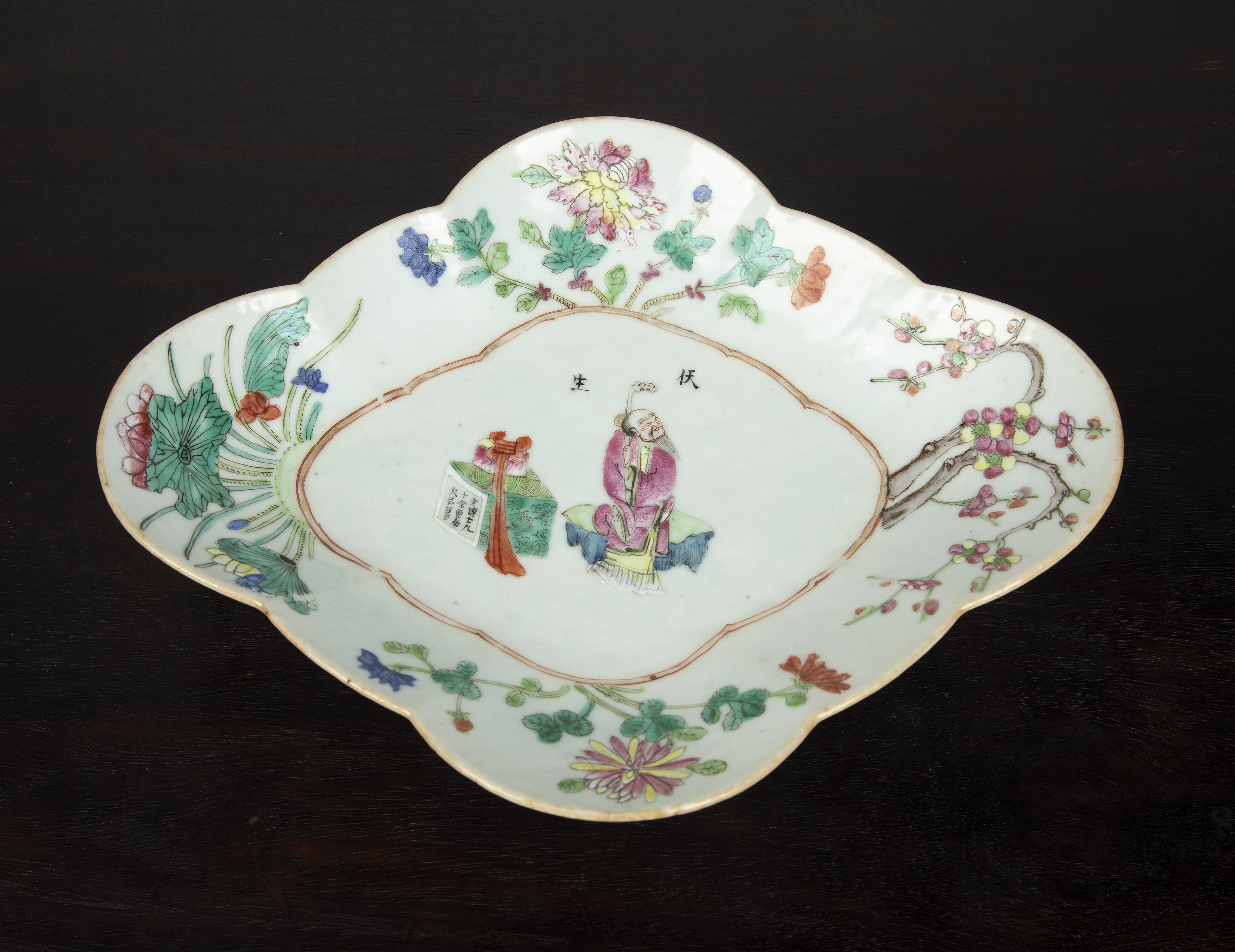 Appraisal: Quatrefoil polychrome dish Chinese th Century decorated with an immortal