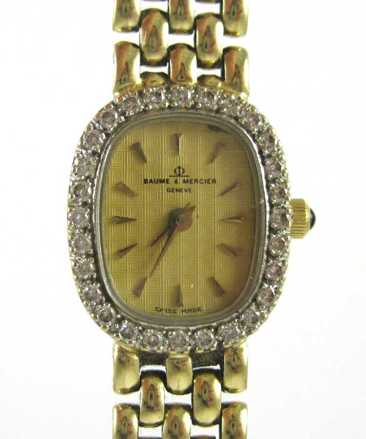 Appraisal: LADY'S BAUME MERCIER DIAMOND AND YELLOW GOLD WRIST WATCH K