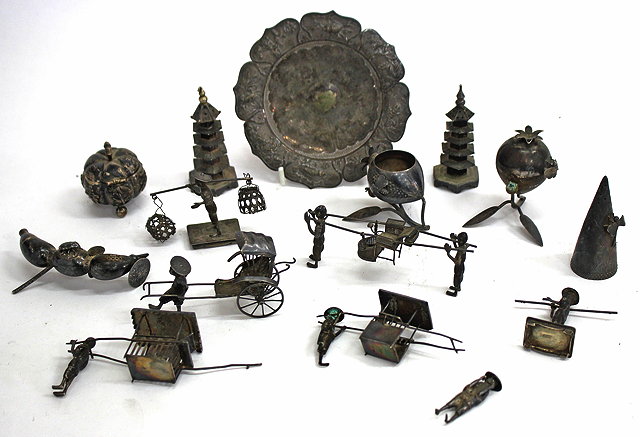 Appraisal: A GROUP OF ANTIQUE ORIENTAL SILVER CONDIMENTS and miniature figures