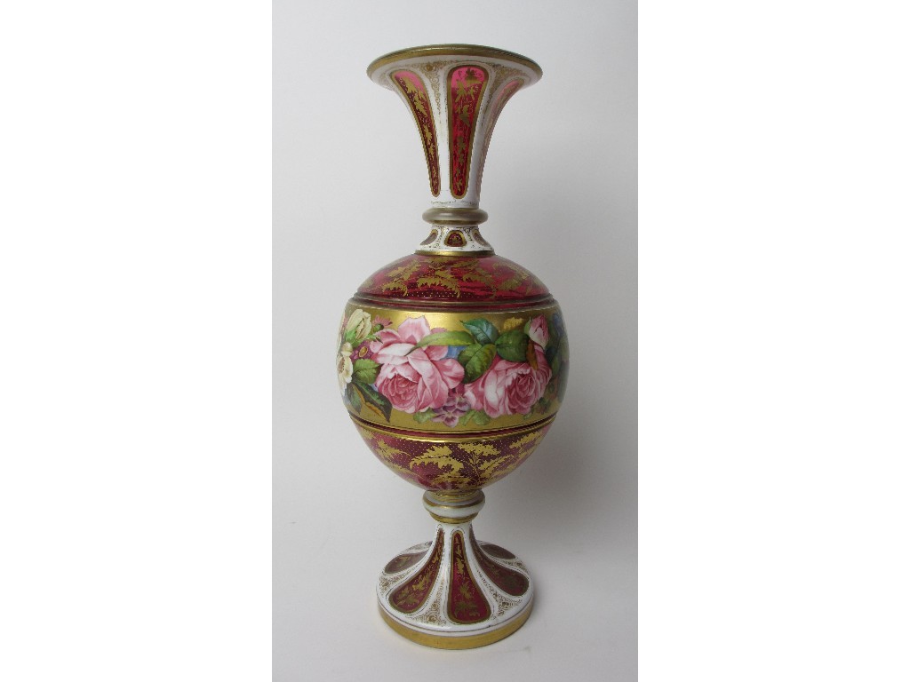 Appraisal: A Bohemian white overlaid glass vase painted with a gilt