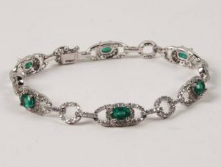 Appraisal: K WHITE GOLD DIAMOND AND EMERALD BRACELET HAVING CTW DIAMONDS