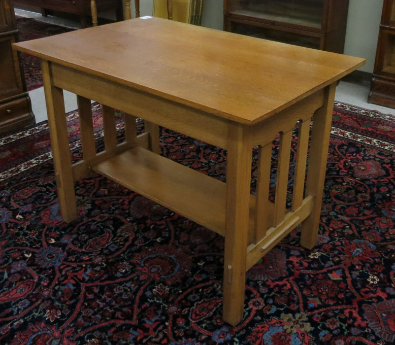 Appraisal: STICKLEY-LABELED OAK LIBRARY TABLE Arts Crafts style c - having