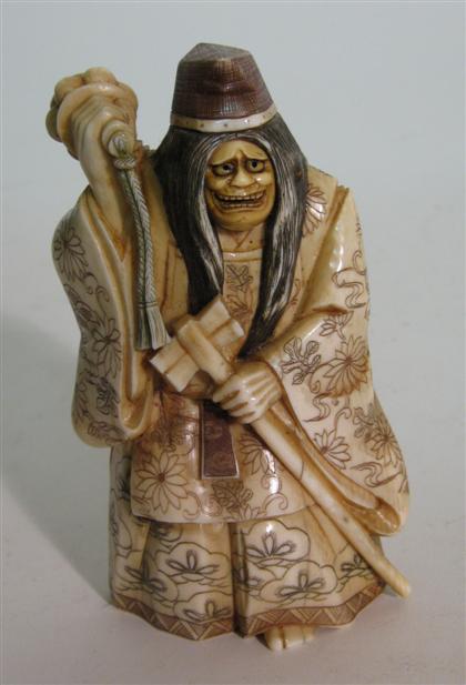 Appraisal: Chinese carved and painted ivory figure With revolving face from