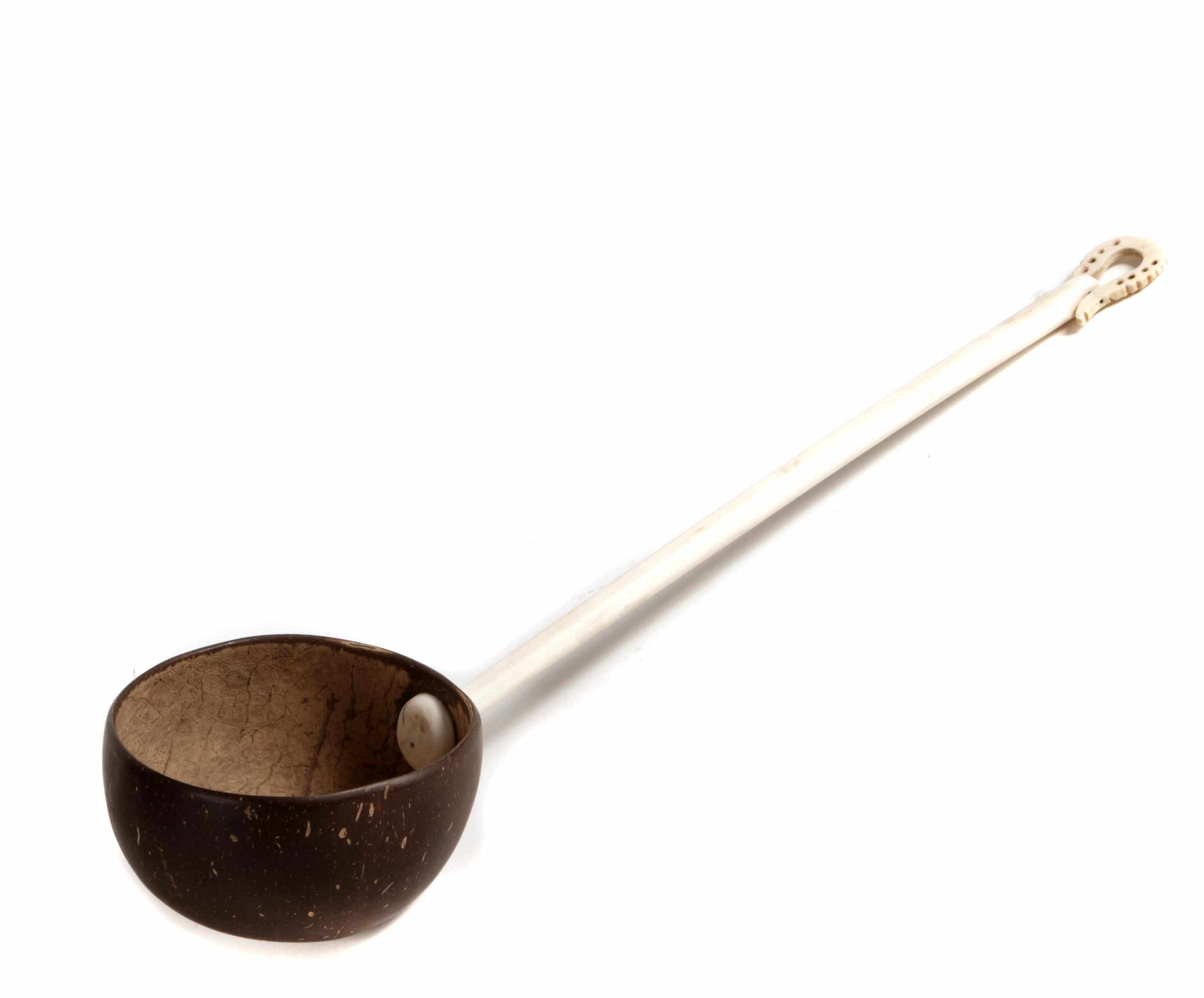 Appraisal: A coconut shell and ivory handled ladle th centurylength in