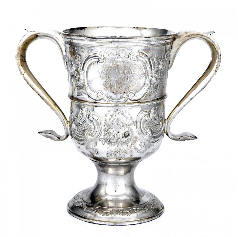 Appraisal: A GEORGE III TWO-HANDLED CUP with moulded girdle and foot