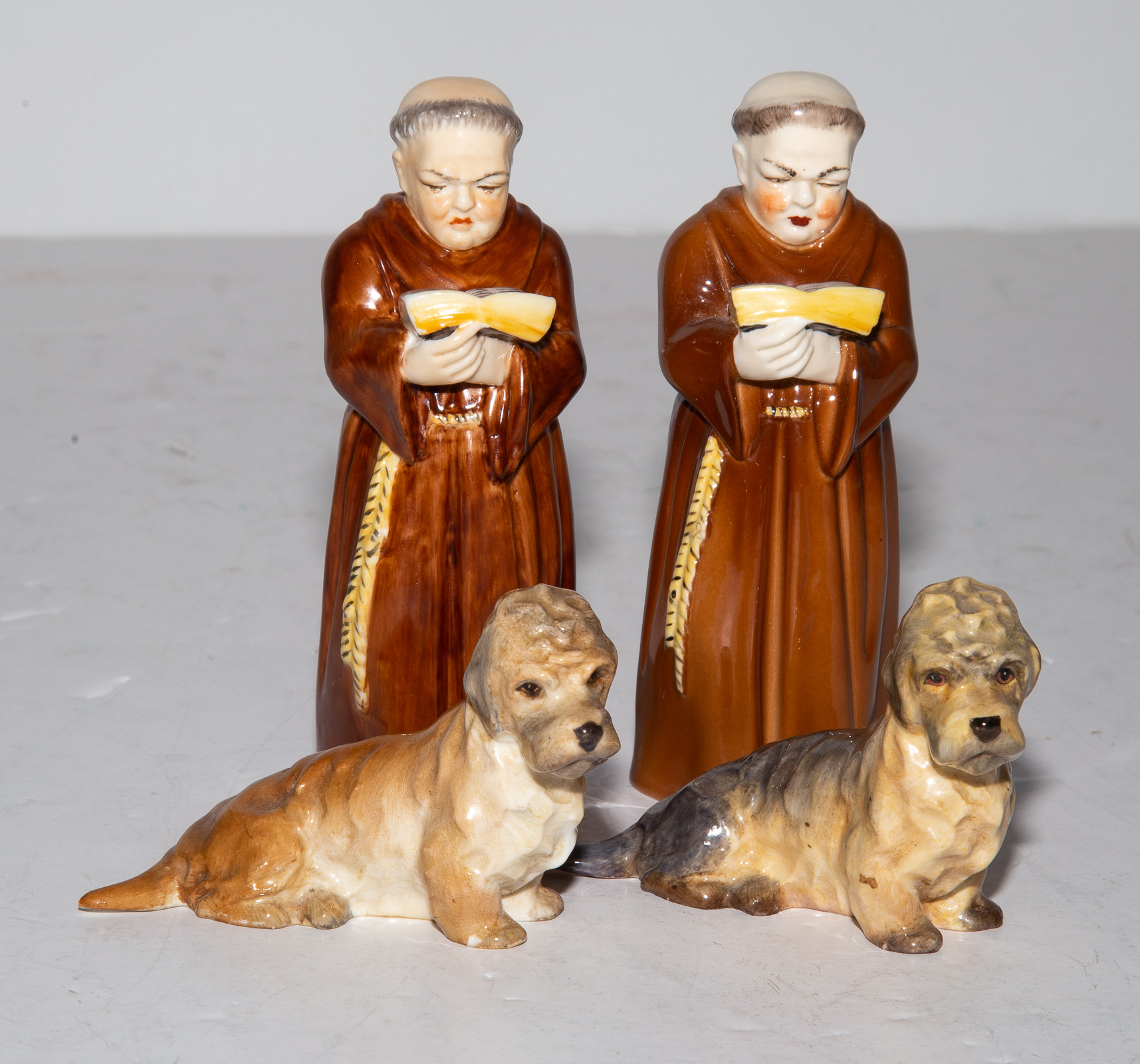 Appraisal: FOUR ROYAL WORCESTER FIGURES Including two figures of a monk