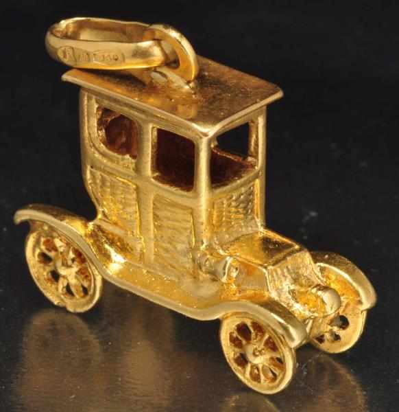 Appraisal: K Y Gold Antique Car Pendant Charm Description Weight dwt