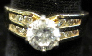 Appraisal: Lady's karat yellow gold diamond engagement ring Approximately carat round