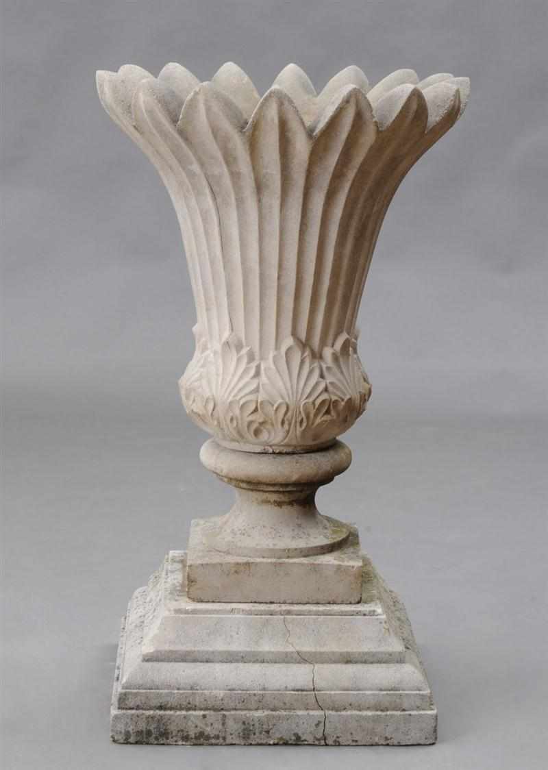 Appraisal: CARVED PAPYRUS LIMESTONE JARDINI RE The flared fluted bowl with