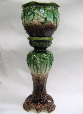 Appraisal: ENGLISH ART POTTERY JARDINIERE AND STAND in a bamboo pattern