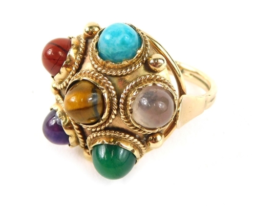 Appraisal: An Eastern inspired multi stone dress ring of circular form