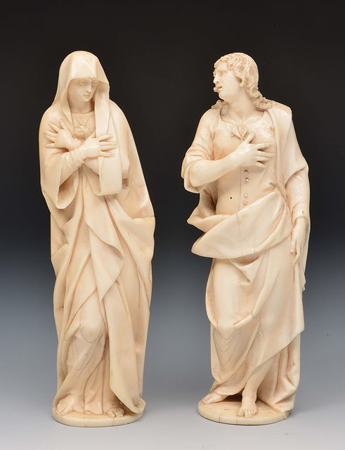 Appraisal: Pair of Dieppe carved ivory figurescirca cm high