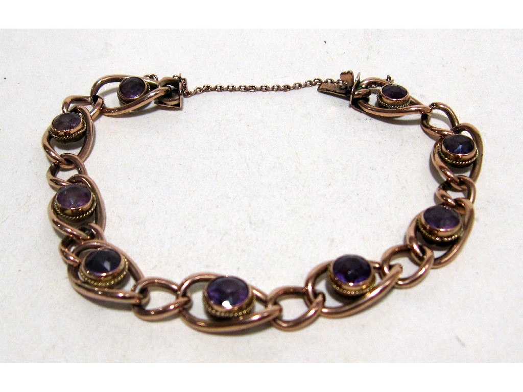 Appraisal: Nine carat rose gold amethyst set curb link bracelet