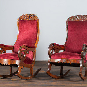 Appraisal: A Matched Pair of Victorian Carved Walnut Rocker Armchairs Circa