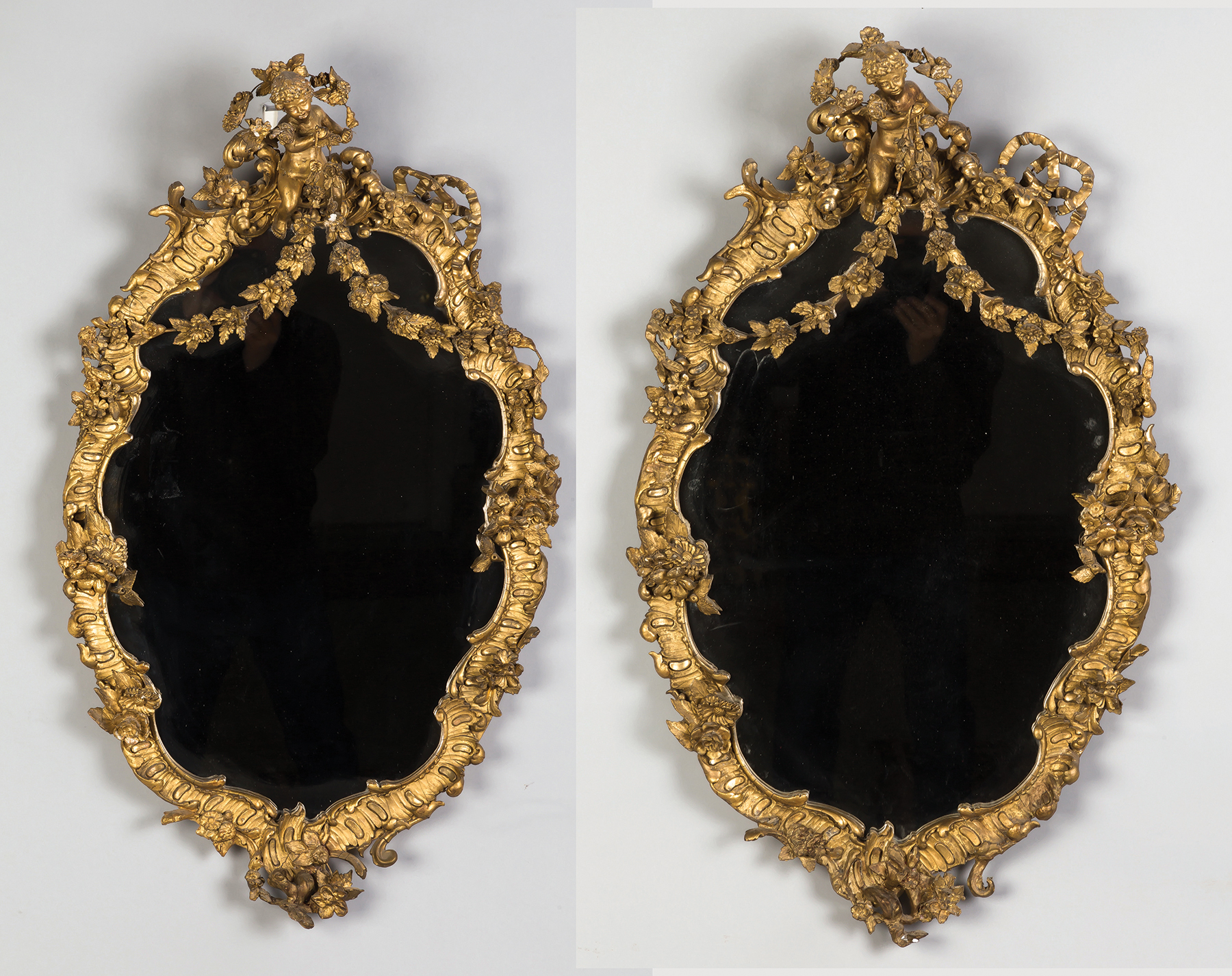 Appraisal: Pair of Continental Gilt Wood Mirrors th century