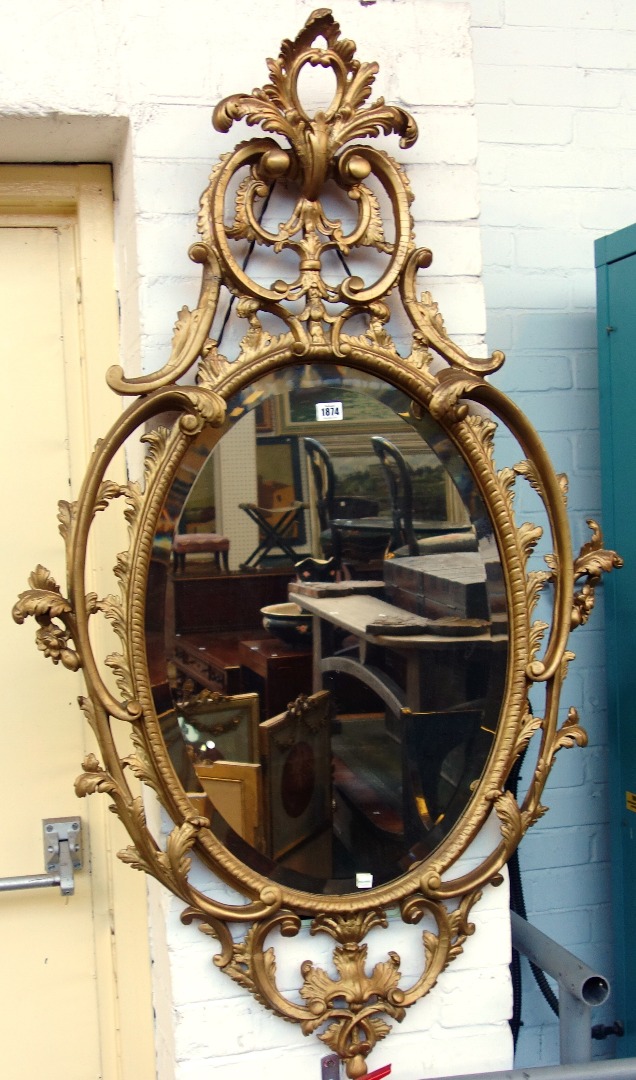 Appraisal: A George III and later gilt framed mirror with opposing