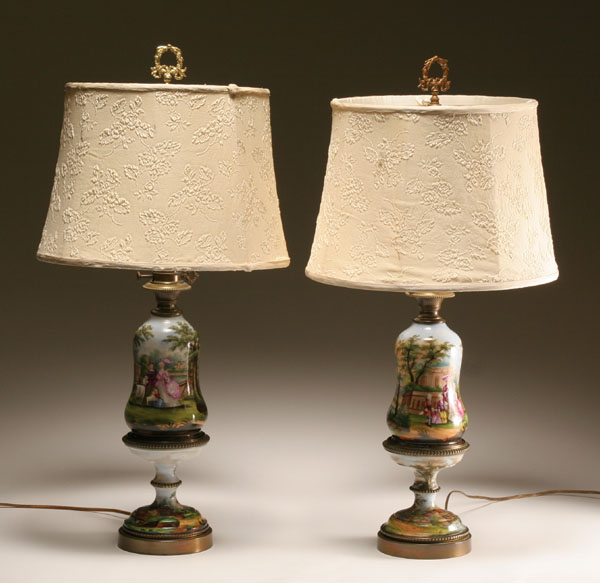 Appraisal: Pair French porcelain hand painted lamps both extensively decorated with