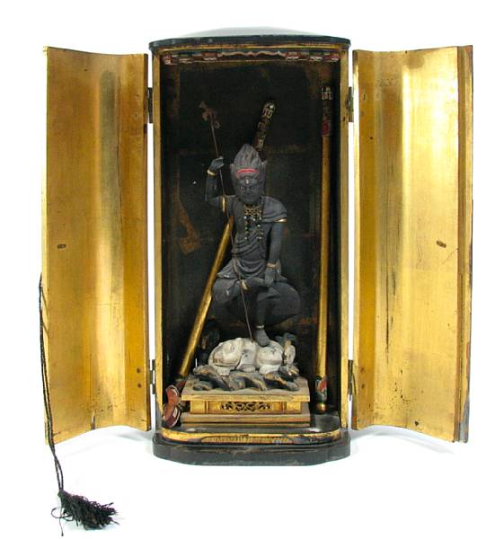 Appraisal: A Japanese traveling wood deity with lacquer fitted box with