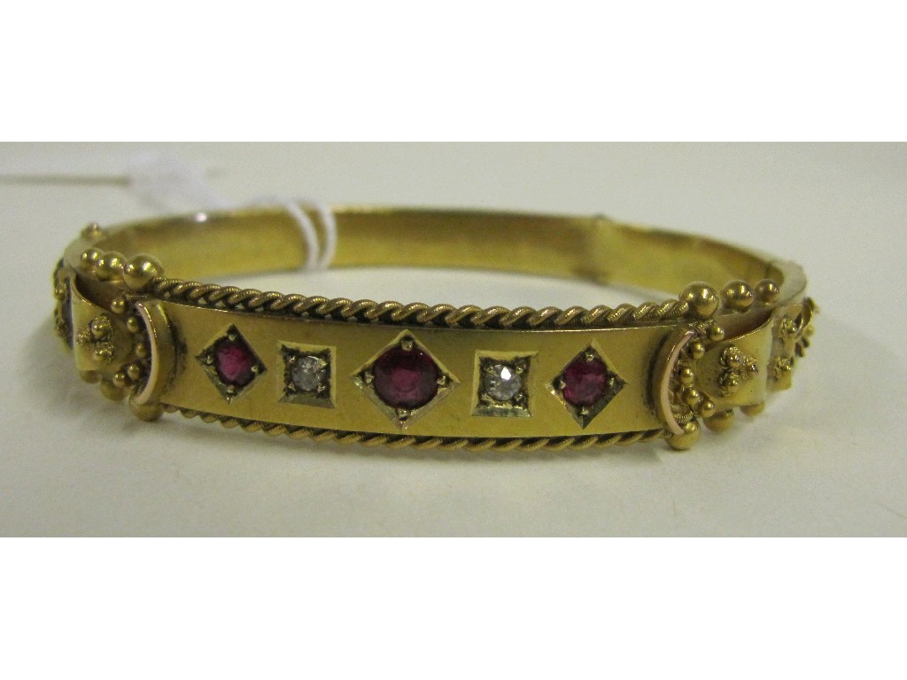 Appraisal: Victorian ct gold ruby and diamond set bangle