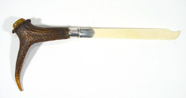 Appraisal: Silver collared ivory bladed letter opener with horn handle London