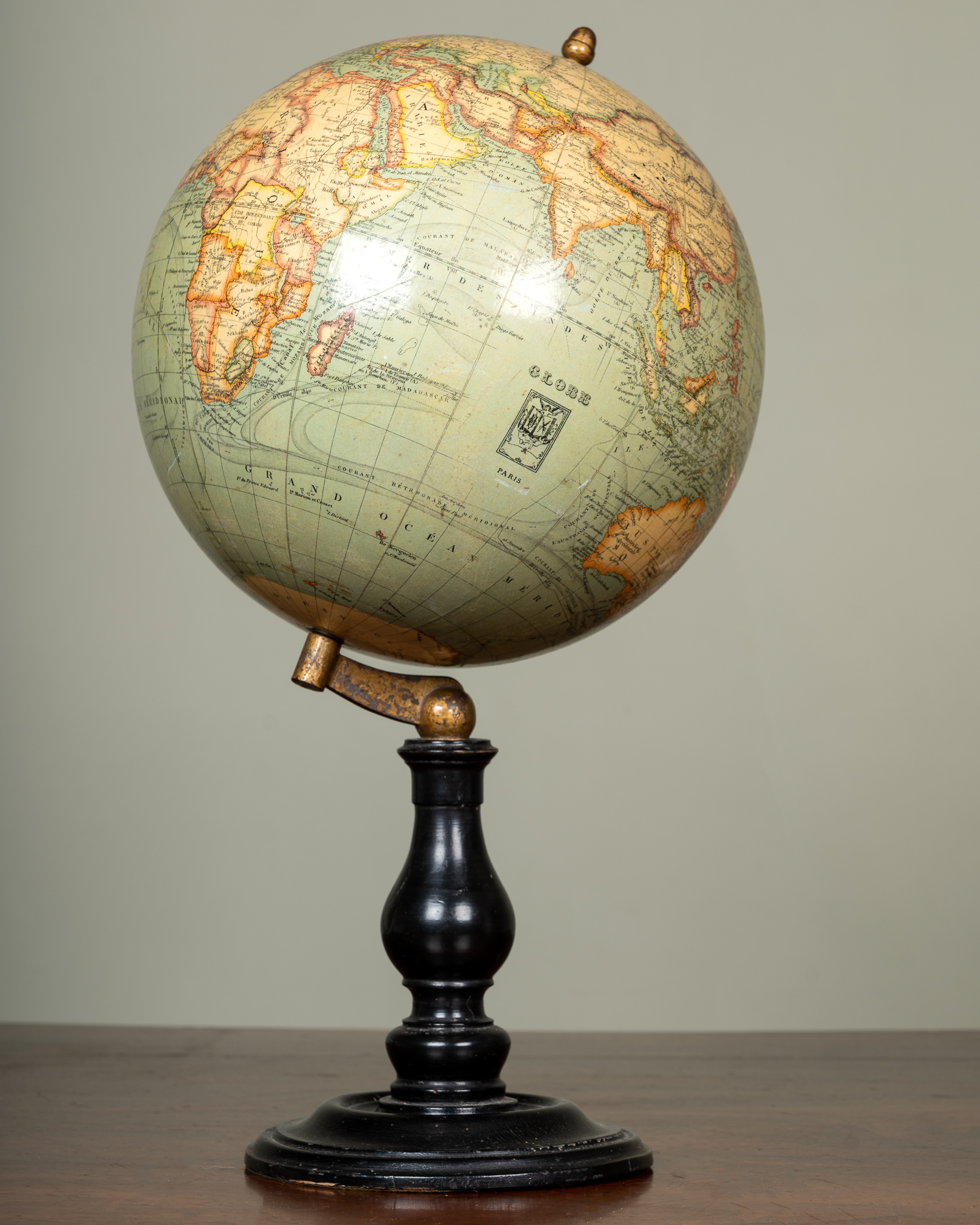 Appraisal: A French terrestrial globe on a turned ebonised stand cm