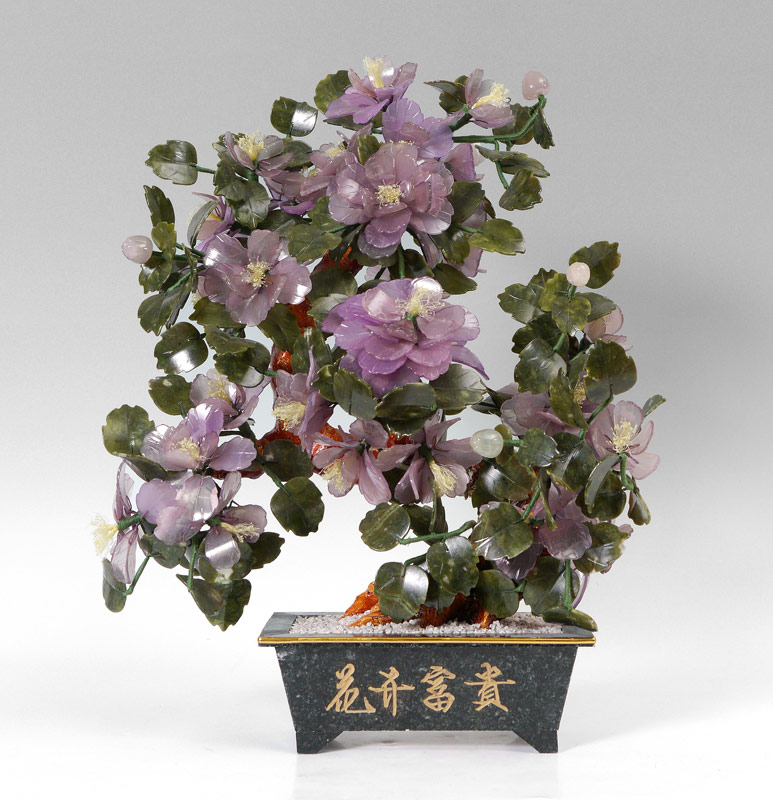 Appraisal: CHINESE CARVED STONE FLOWER TREE Purple peony tree quartz and