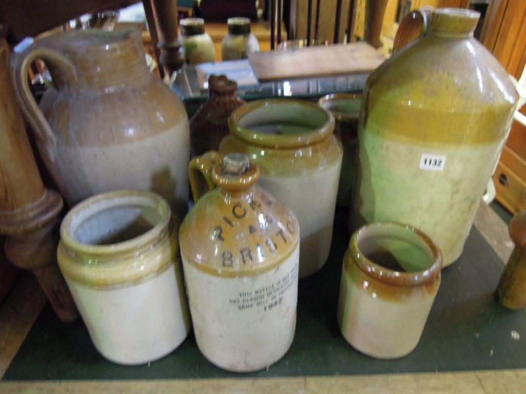 Appraisal: A collection of stoneware flagons pitcher and jars including two