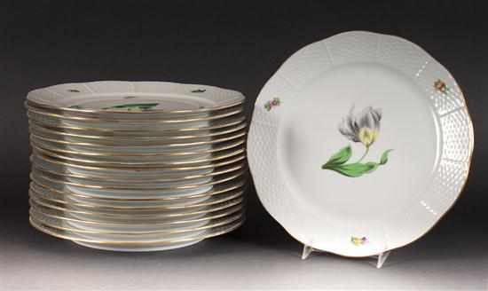 Appraisal: Set of seventeen Herend floral decorated porcelain dinner plates in