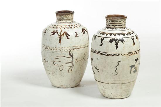 Appraisal: PAIR OF WINE VESSELS Northern China early th century terra