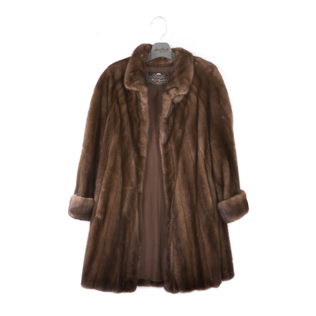 Appraisal: A Lady's Mink Coat by Karl Lagerfeld Shades of rich