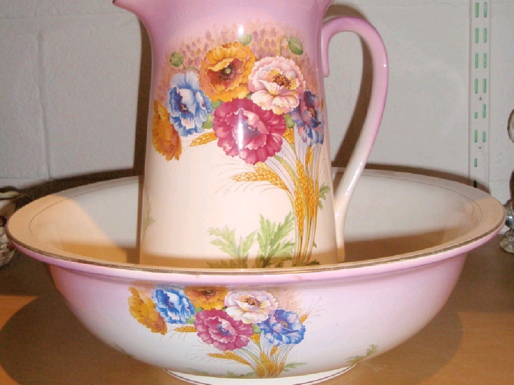 Appraisal: A Falcon ware floral decorated toilet jug and bowl