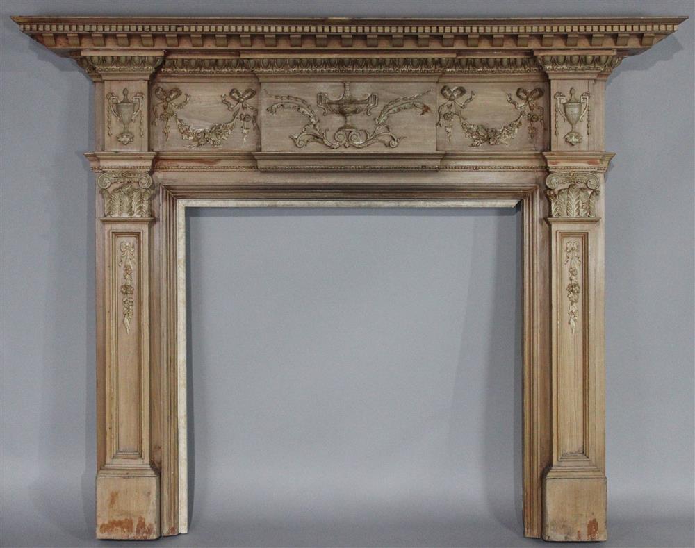 Appraisal: NEOCLASSICAL STYLE CARVED WOOD FIREPLACE MANTEL AND SURROUND having a