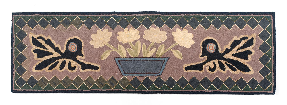 Appraisal: NEW ENGLAND HOOKED HEARTH RUG WITH CENTRAL BASKET OF FLOWERS