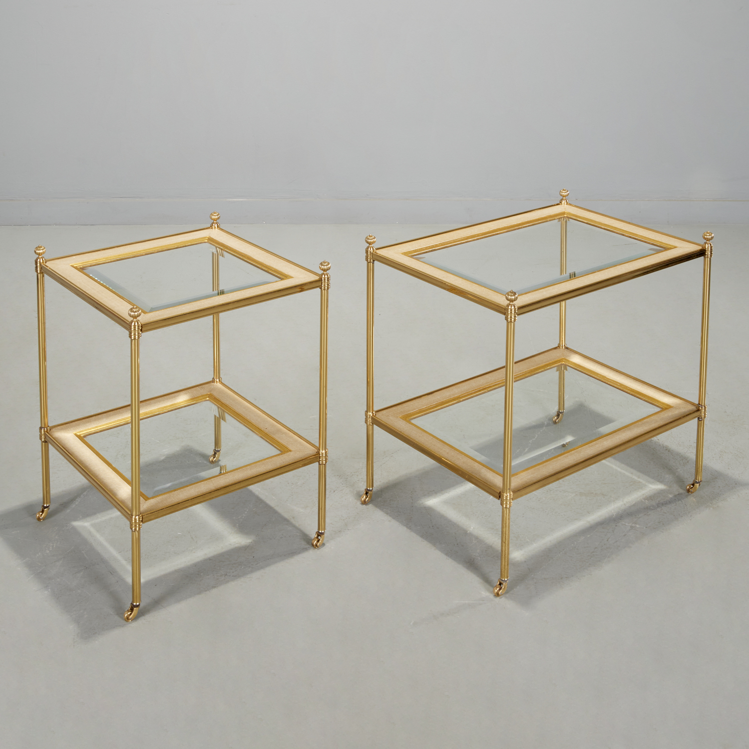 Appraisal: MALLETT ATTRIB TWO-TIER ETAGERE TABLES th c polished brass wood