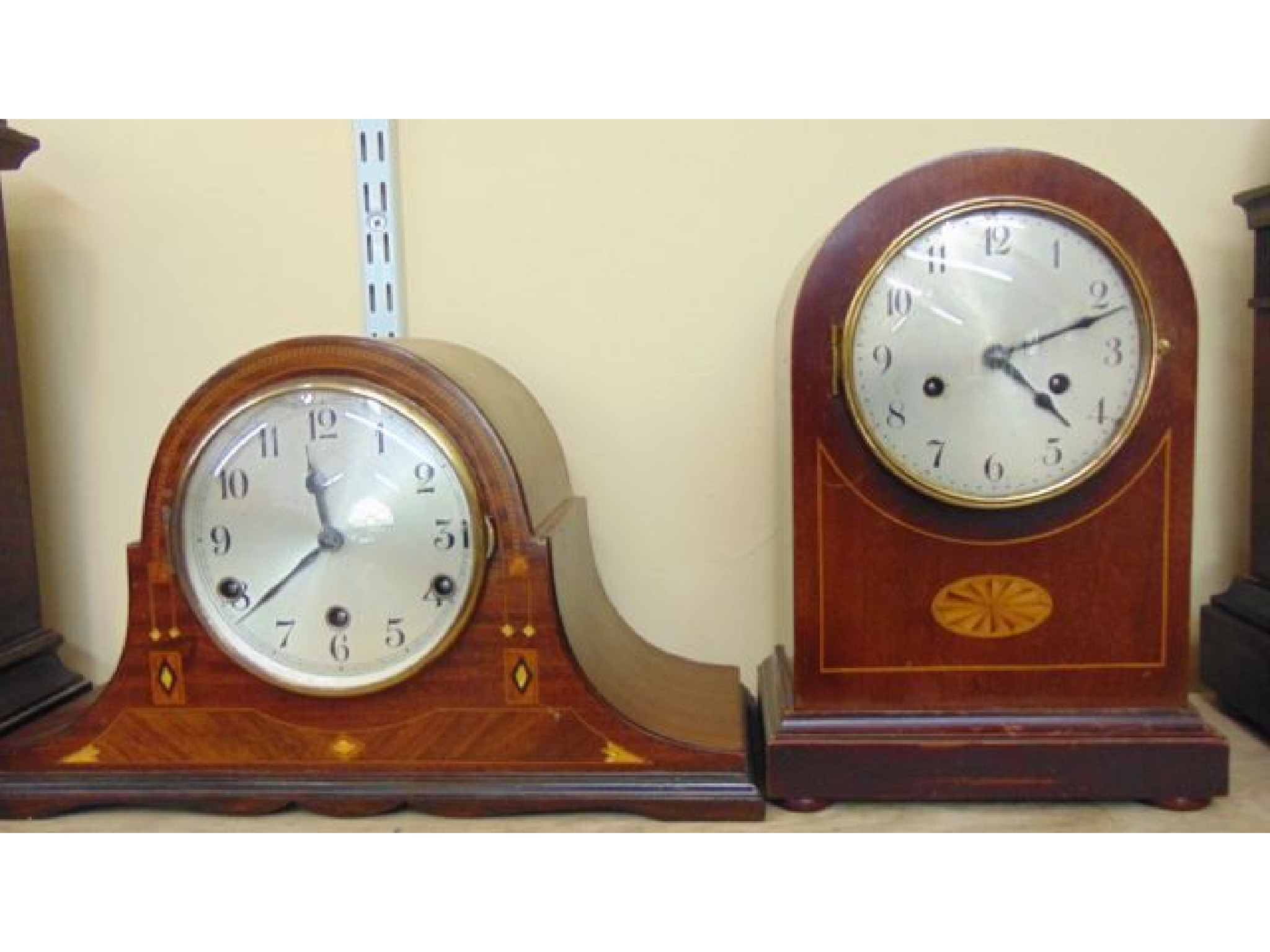 Appraisal: A s inlaid mahogany top hat mantle clock with Westminster