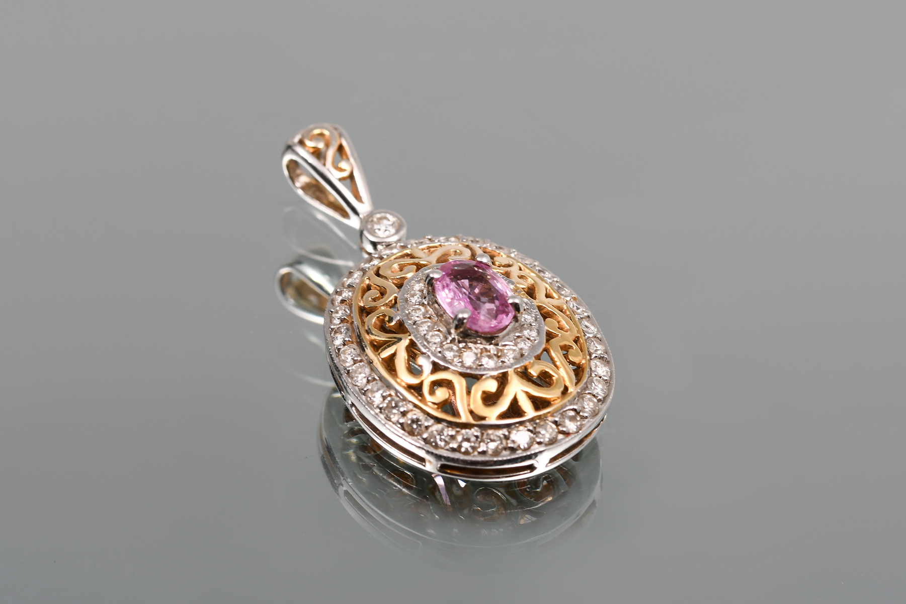 Appraisal: K SAPPHIRE DIAMOND PENDANT A lovely K Two-Tone Gold Pendant