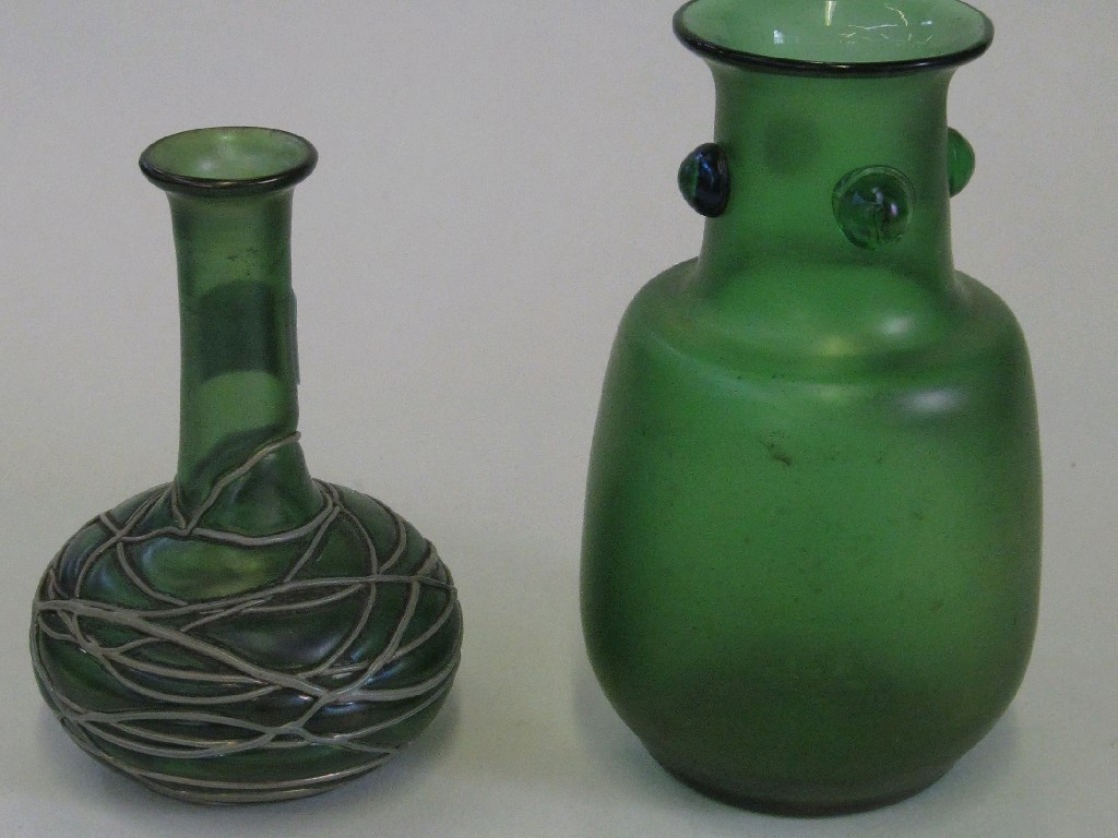 Appraisal: Two Art Nouveau green glass vases with iridescent lustre