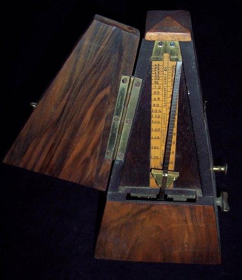 Appraisal: A walnut cased metronome 'Metronome de Maelzel London' cm high