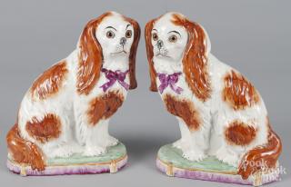 Appraisal: Pair of Staffordshire spaniels with glass eyes '' h