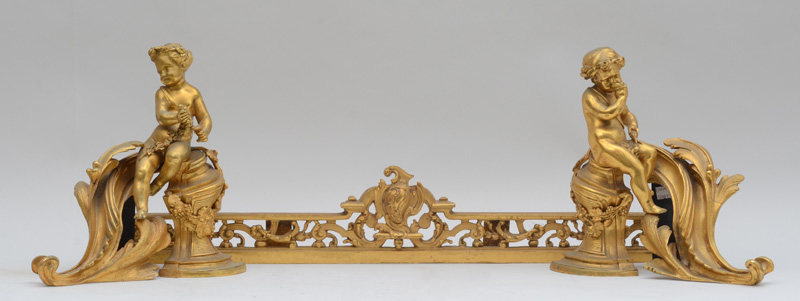 Appraisal: PAIR OF LOUIS XV STYLE GILT-BRONZE CHENETS Joined by a