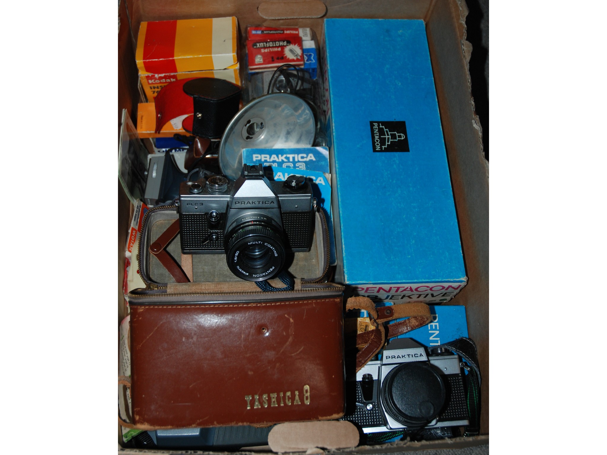 Appraisal: A collection of cameras and equipment including Praktica mm etc