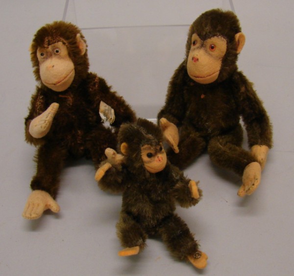 Appraisal: Lot of brown mohair Jocko monkeys Has a silver incised