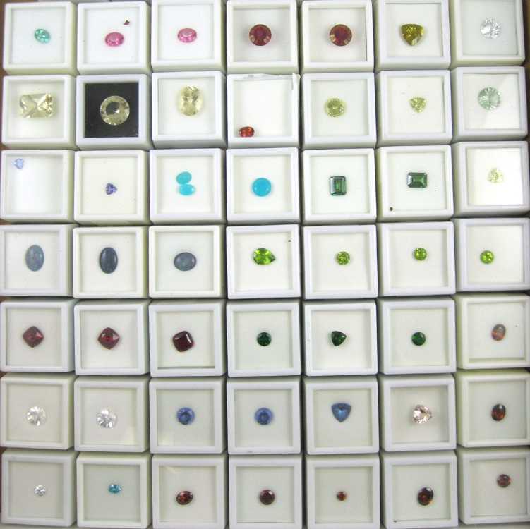 Appraisal: COLLECTION OF SIXTY UNSET GEMSTONES including paraiba chalcedony tanzanite opal