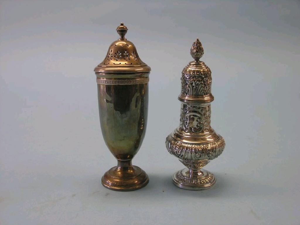 Appraisal: A late Victorian embossed silver sugar caster baluster shape Sheffield