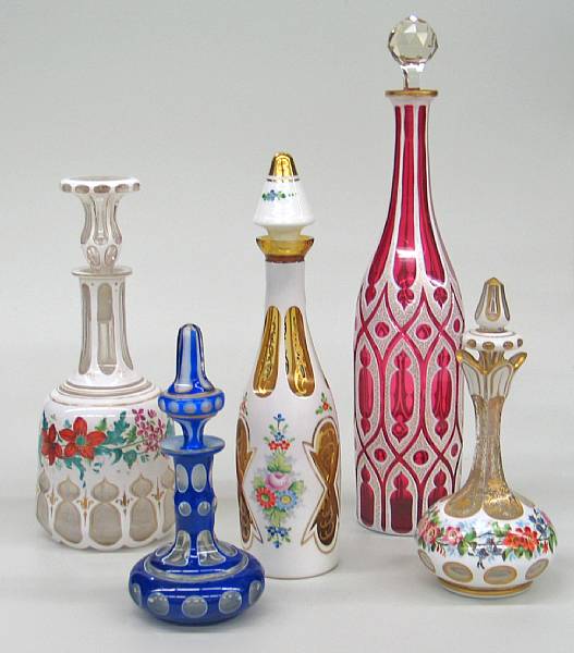 Appraisal: Five Bohemian opaque cased cut to clear glass decanters or