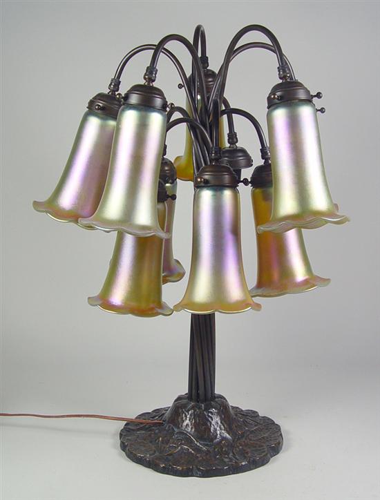 Appraisal: Tiffany Style Bronze Table Lamp th Century Bronze ten-lamp cluster